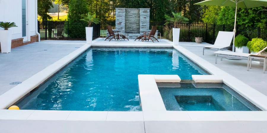 Maintaining the Oasis: 3 Tips for Caring for Your Poolside Concrete